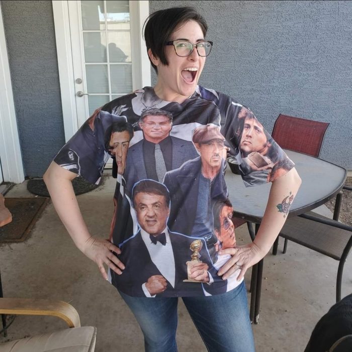 Podcast guest Lauren Knight sports a Sylvester Stallone collage shirt.