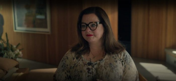 Melissa McCarthy tearfully smiles in the Hulu original miniseries Nine Perfect Strangers