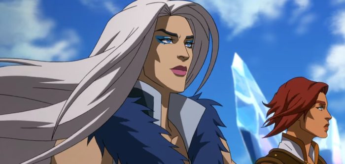 Evil-Lyn lets her white hair flow as she and Teela look out into the distance with the sky behind them