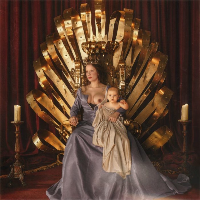 Halsey poses bare chested on her throne with a baby in her arms on the cover of her new album If I Can't Have Love, I Want Power