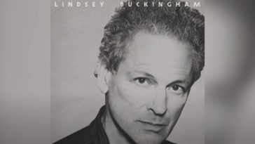 Lindsey Buckingham with his head slightly tilted in grey on the cover of his self-titled album