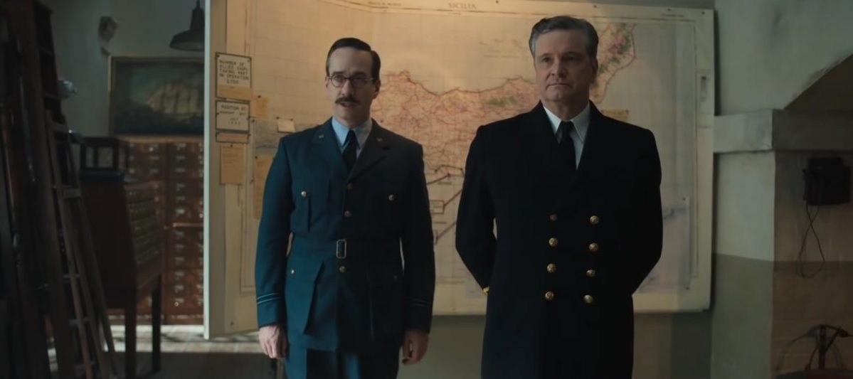 Matthew Macfadyen stands beside Colin Firth in front of a map in Operation Mincemeat