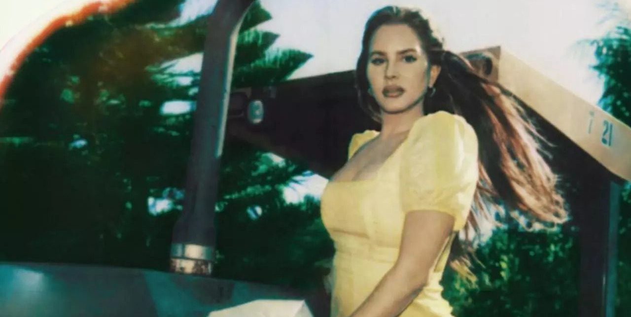 Lana Del Rey in a dress in artwork for Blue Banisters
