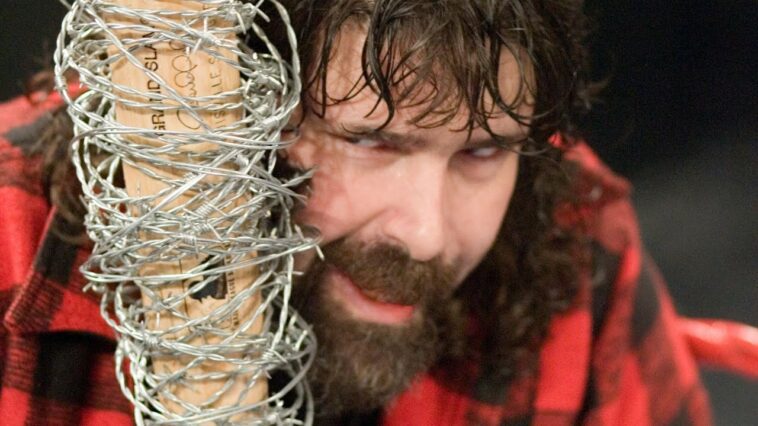 Mick Foley and Barbie in a hardcore/deathmatch