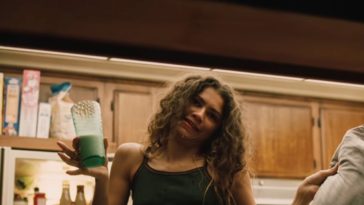 Zendaya cocks her head and cringes as liquid rolls from her mouth to chin in Euphoria Season Two