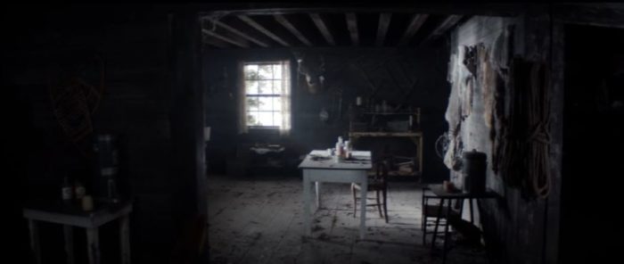 The interior of the cabin is rather rustic, with a table in the middle of the room in Yellowjackets "The Dollhouse"