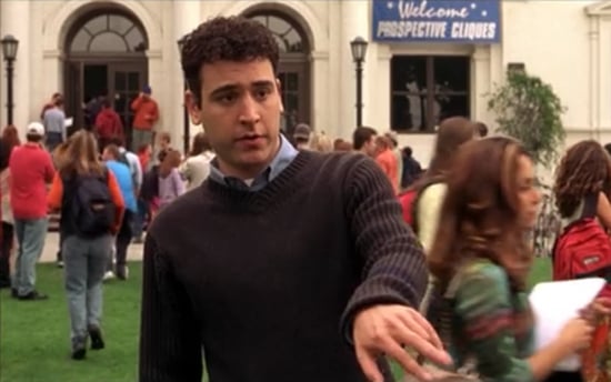 Josh Radnor's character from Not Another Teen Movie, a sign reading "prospective cliques welcome!" in the background