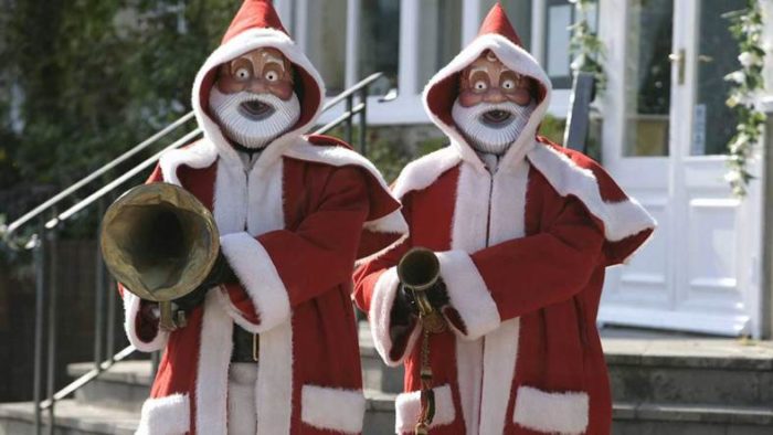 Robot Santas about to attack with their brass instruments in 'The Runaway Bride'