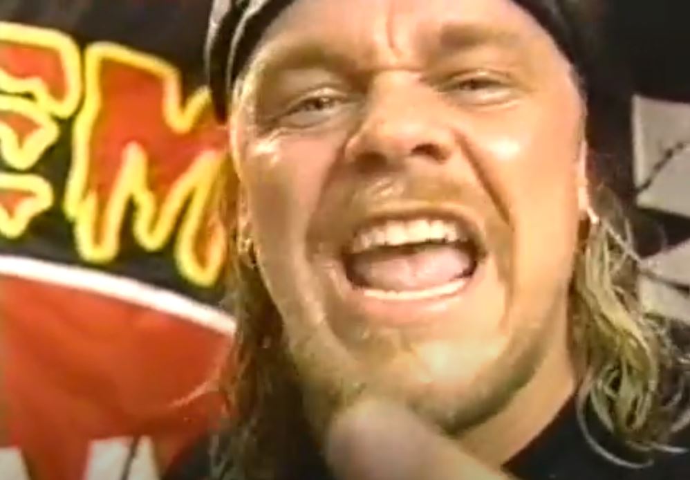 Shane Douglas talking to the camera and pointing a finger