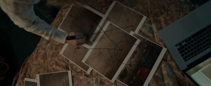 Misty draws the symbol connecting dots on crime scene photos