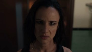 Natalie (Juliette Lewis) stares forward, her face nearly filling the frame, in Yellowjackets S1E4
