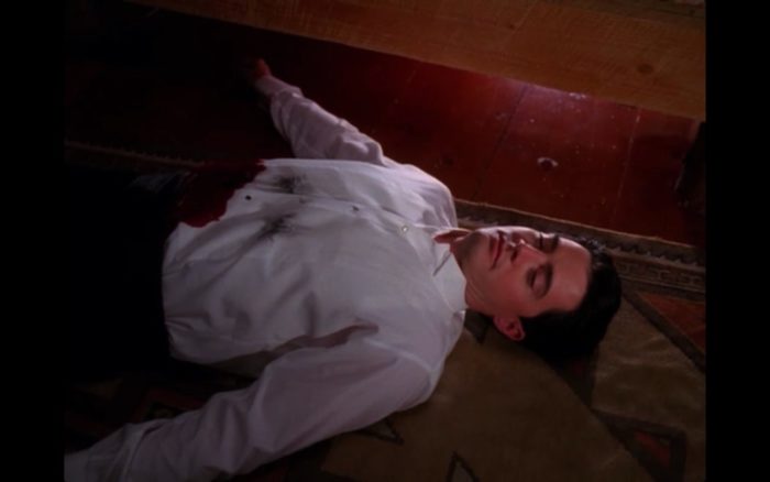 Agent Cooper lies bleeding on the floor