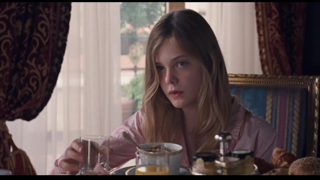Image from Somewhere: Cleo (Elle Fanning) at a hotel breakfast.