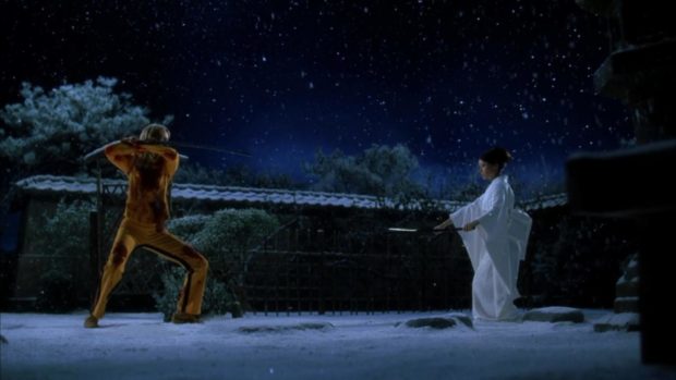 The Bride (Uma Thurman) squares off against O-Ren Ishii (Lucy Liu) a top a snowy roof in KILL BILL VOL. 1.