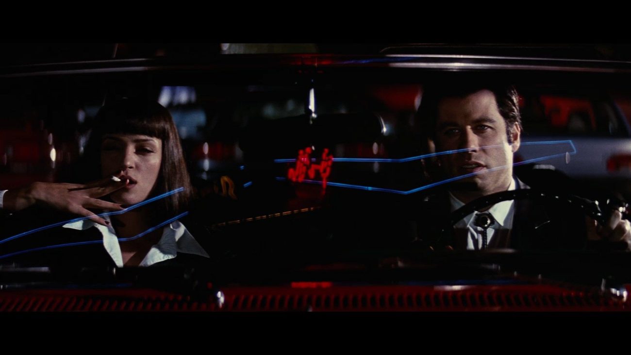 Mia (Uma Thurman) and Vincent (John Travolta) roll up to Jack Rabbit Slims for dinner in PULP FICTION.
