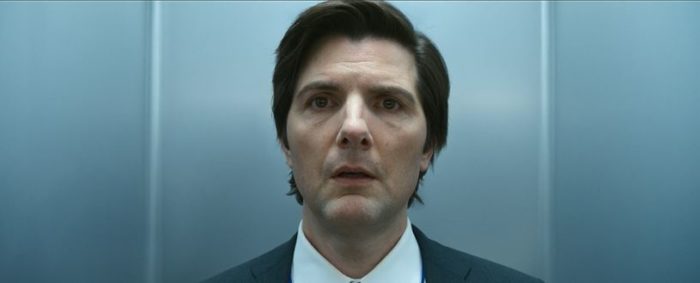 Mark looks distraught as he stands in an elevator in Severance S1E5