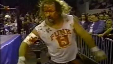 Terry Funk in a Funk U shirt, bloodied