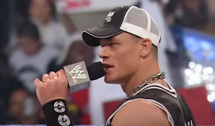 John Cena talks into a microphone
