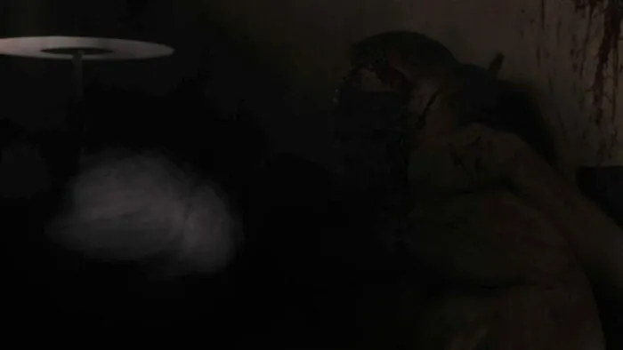 The Experiment attacks Tracey and Sam, appearing as a penis next to their bloodied heads.