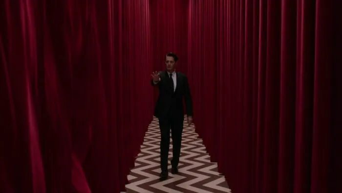 Cooper opening the Red Room drapes with telekinesis.