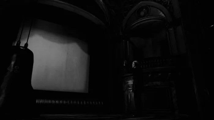 The Fireman looking at his movie screen.