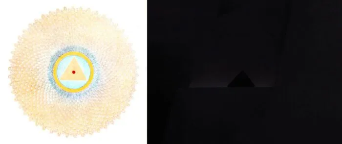 Sahasrara symbol with a triangle at the center, and the Fireman's palace with a triangle entryway.