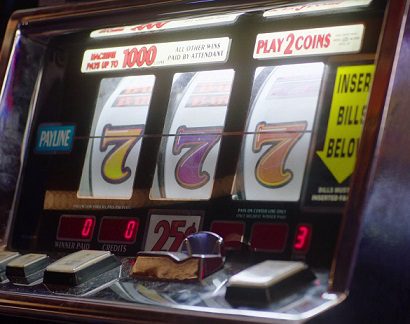 The slot machine in the Silver Mustang Casino with three 7's.