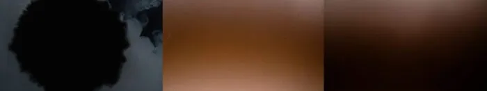 Black substance filling screen, next to colour orange, next to orange turning black.