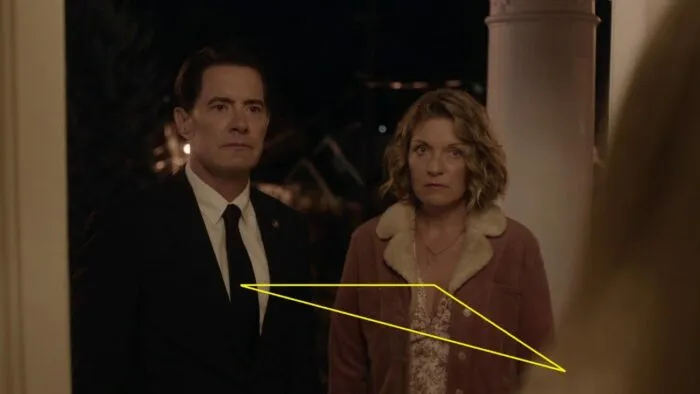 Richard and Carrie and Alice standing in a triangle formation at the front door of the Palmer house..