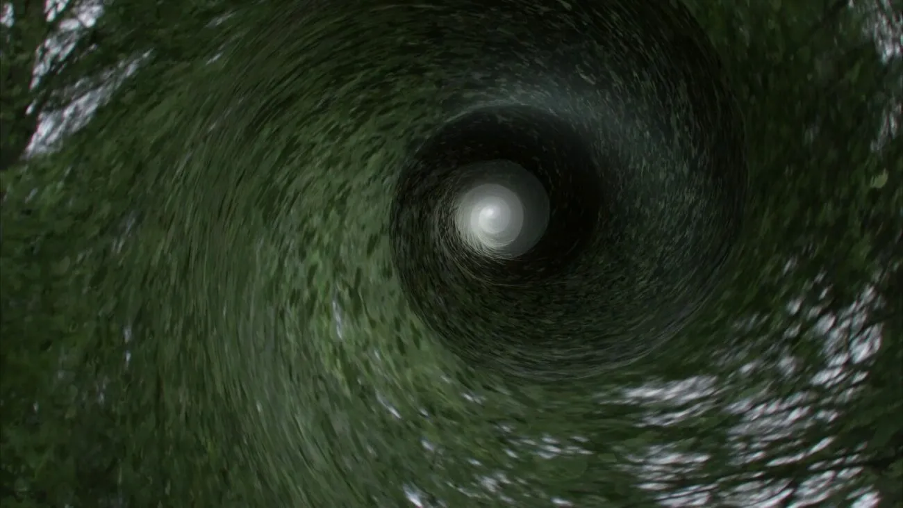 A whirling vortex in the sky, leading to light.