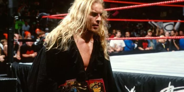 Christian wields the Light Heavyweight championship.