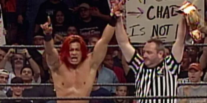 Essa Rios has his hand raised by the referee after his title win.