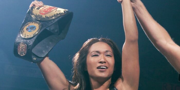Gail Kim raises the Divas belt aloft