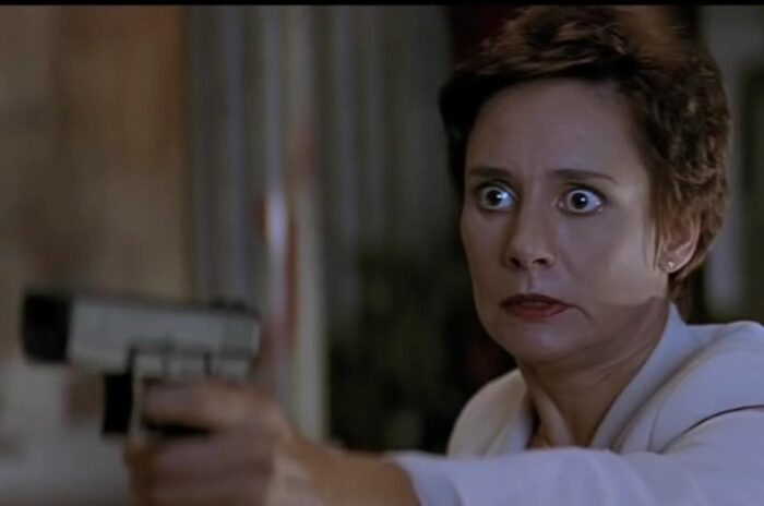 Debbie points a gun in Scream 2