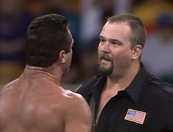 Rick Rude and The Boss stare each other out at Starrcade '93