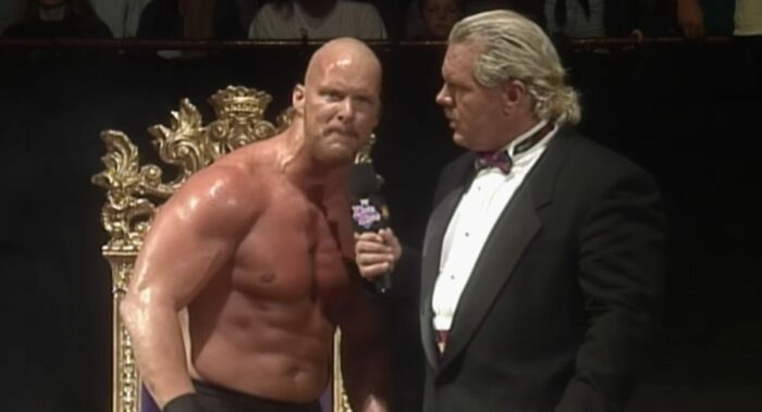 Dok Hendrix interviews a bitter and irritated-looking Steve Austin, delivering his Austin 3:16 promo.