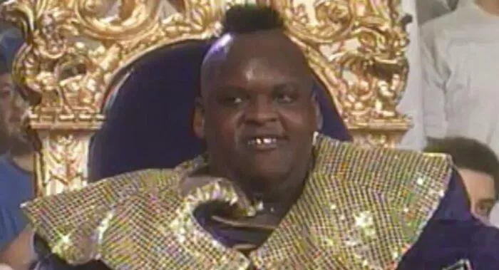 Mabel sits atop a throne after just winning the tournament.