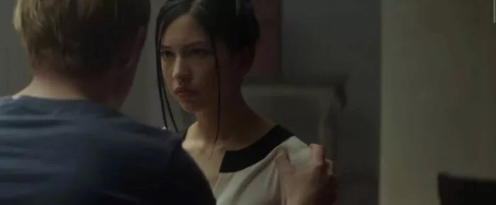 Caleb holding Kyoko's shoulders