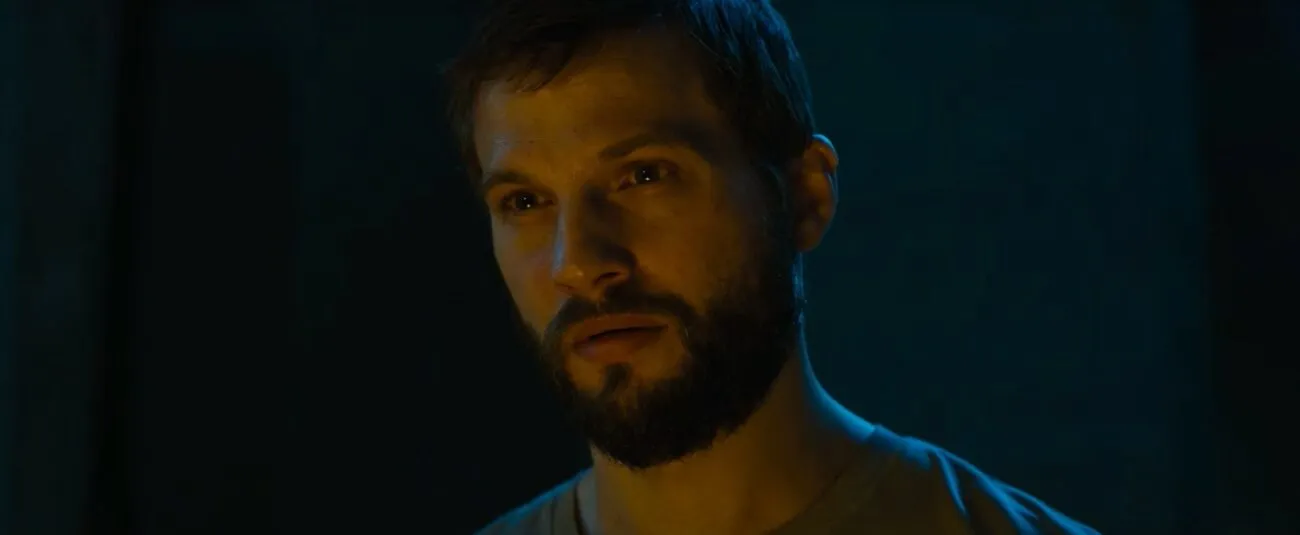 A close-up of Grey's face