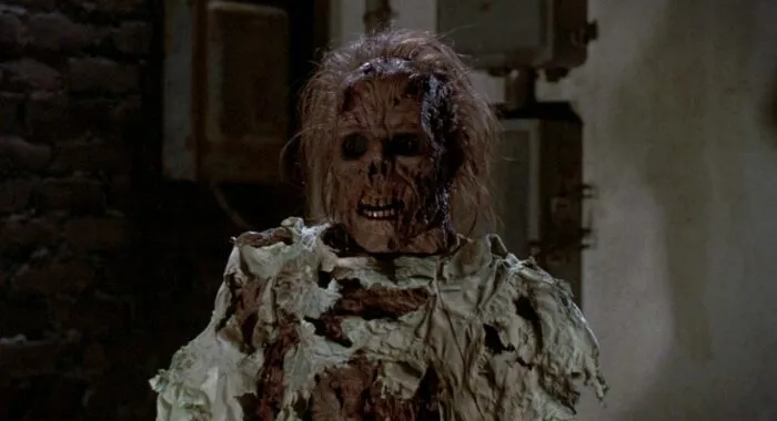 The corpse of the escaped patient, killed by Det Cameron, reanimates after getting infected by one of the alien slugs