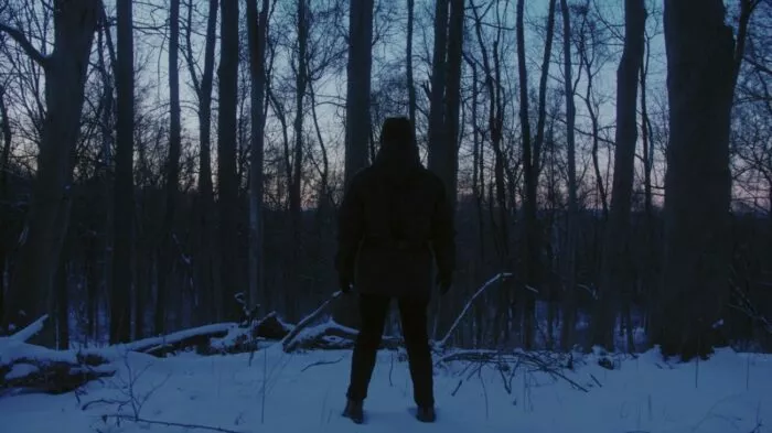 A man outside in the snow