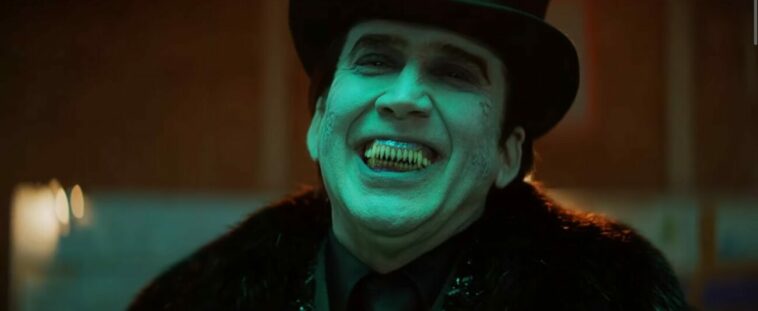 Dracula gives a toothy grin