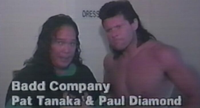 Tanaka dressed in street clothes, Badd Company cut a backstage promo on ECW.