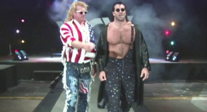 Diamond Dallas Page walks to the ring with The Diamond Stud, whom he managed.