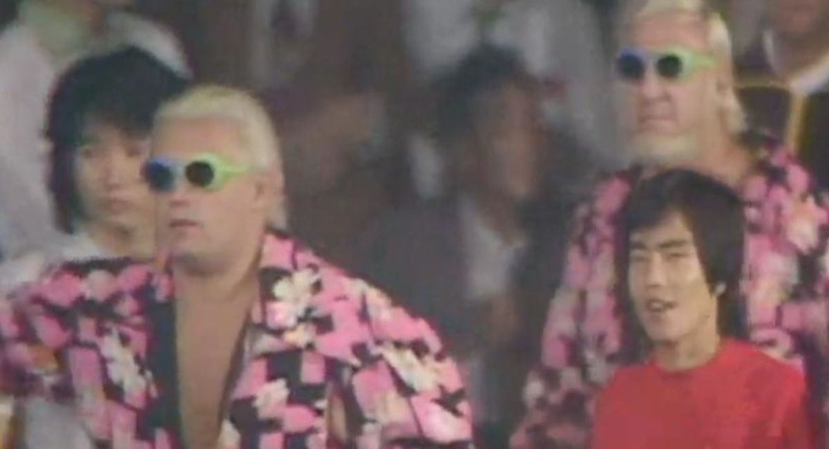 Dressed in pink-decorated jackets and colourful sunglasses, the duo make their way to the ring.