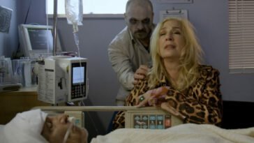 A ghost behind a woman