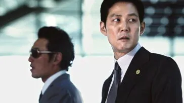 The two main characters from New World in and underground car park.