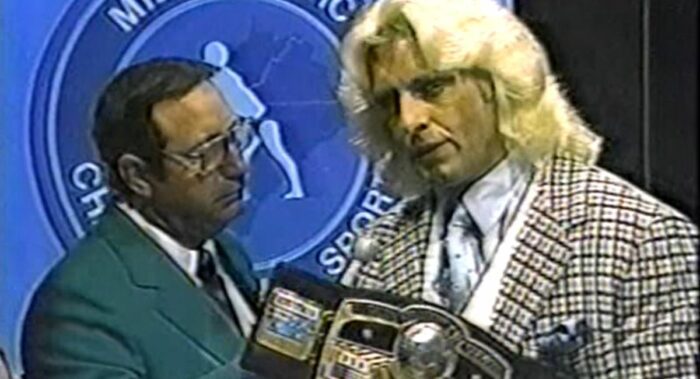 Ric Flair looks into the camera and talks to Bob Caudle on the Mid-Atlantic set