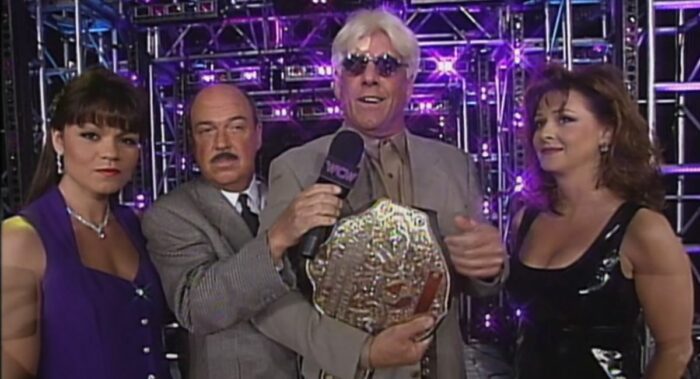 Mean Gene interviews Ric Flair, who is flanked by Woman and Miss Elizabeth