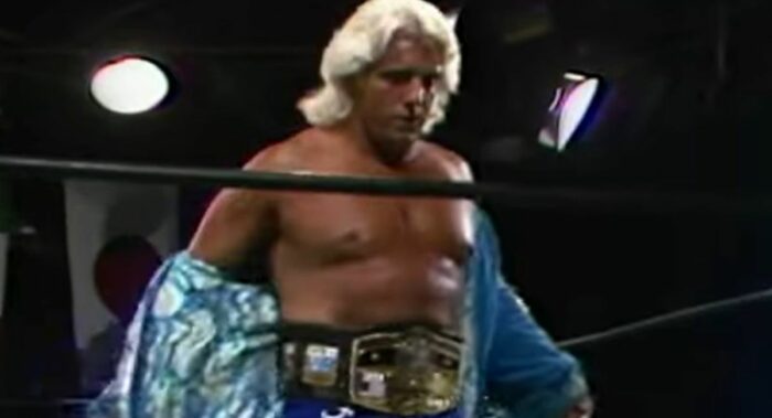 Ric Flair takes off the robe to show off the Ten Pounds of Gold